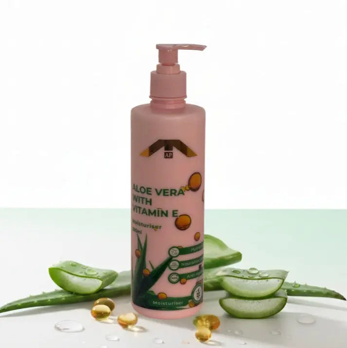 “All People Aloe Vera with Vitamin E Moisturiser bottle with pump, placed among aloe vera slices and vitamin E capsules on a light green and white backdrop.”