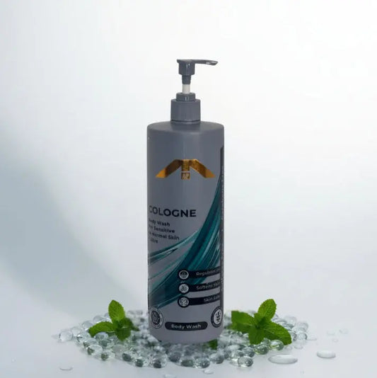 “All People Cologne Body Wash bottle with pump, placed on clear gel beads with mint leaves on a clean white background.”