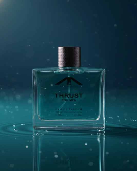 Perfume bottle labeled 'Thrust' on a reflective surface with a dark blue background