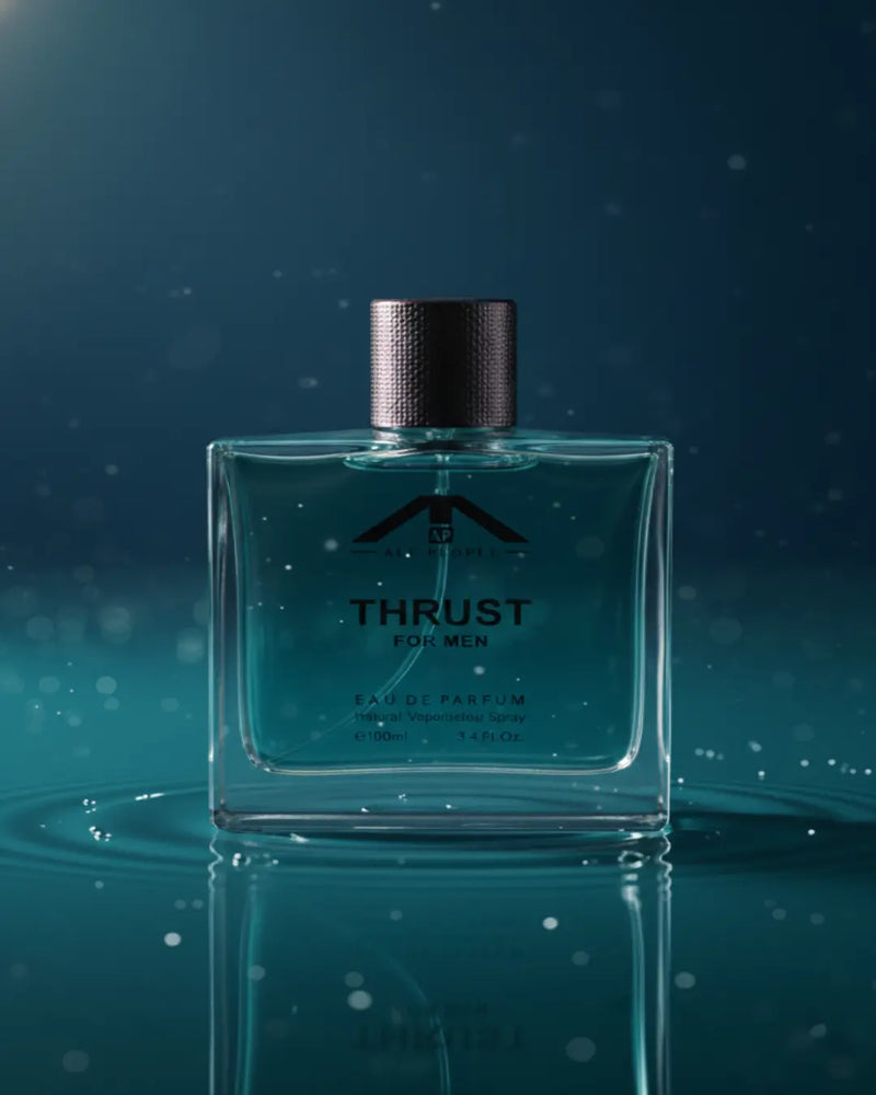 Perfume bottle labeled 'Thrust' on a reflective surface with a dark blue background